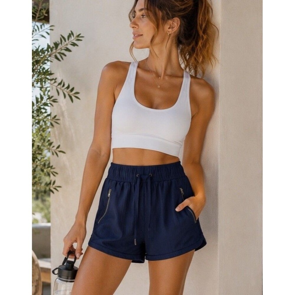 Athleta Navy  Blue Pull On Running Shorts Zip Pocket Drawstring Women’s M